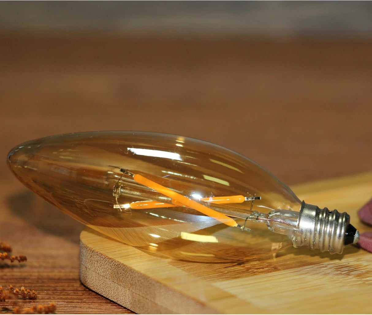 Paquete de 12 Bombillas LED Filamento Vela C32 Ámbar E12 – Luz Cálida 2W