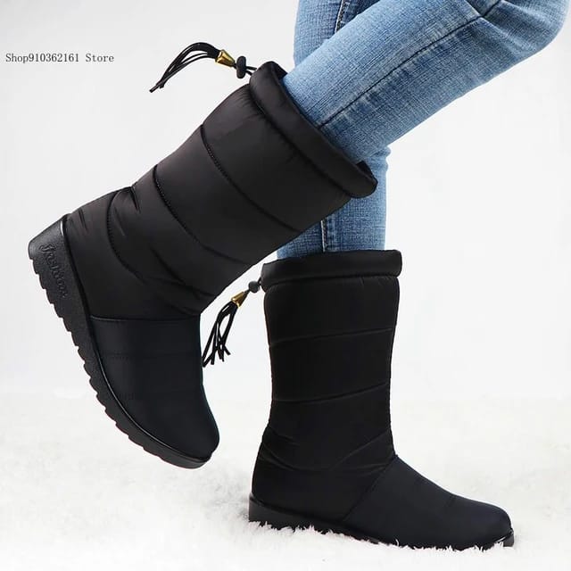 Botas cálidas de piel para Mujer, botines de nieve impermeables con borlas, color negro